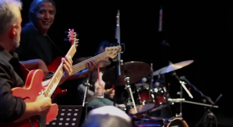 I will record professional live acoustic drums for 2 songs