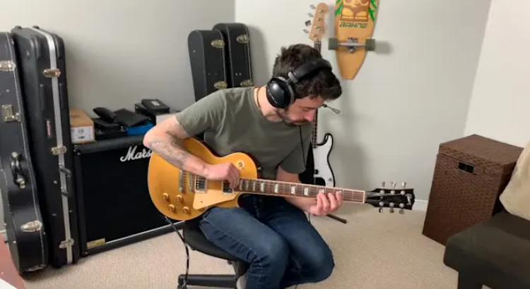 I will play guitar on your rock song